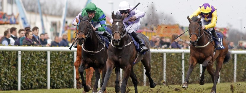 IZZER (centre, Charles Bishop) beats BROKEN SPEAR (left) in The Unibet Brocklesby Stakes Doncaster 24 Mar 2018 - Pic Steven Cargill / Racingfotos.com