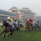 DATSALRIGHTGINO (2nd from far right, Gavin Sheehan) in rear at halfway on his way to winning The Coral Gold Cup as CLOUDY GLEN leads Newbury 2 Dec 2023 - Pic Steven Cargill / Racingfotos.com