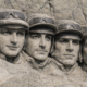 Harry Cobden, Sean Bowen, Gavin Sheehan, Brian Hughes, Harry Skelton and Nico de Boinville, as imagined by ChatGPT on Mount Rushmore